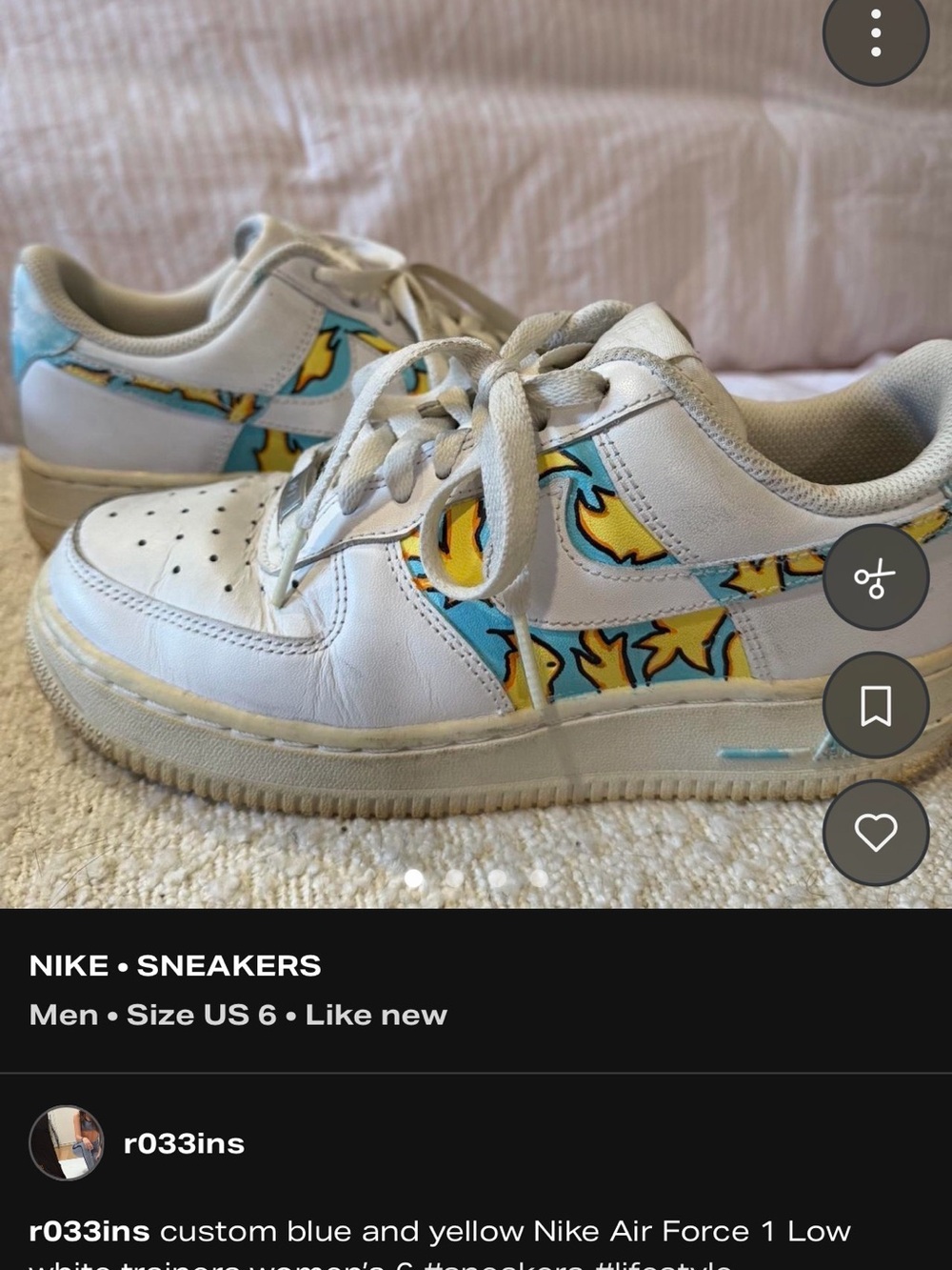 Nike Kids White Sneakers with Blue and Yellow Graphic Swoosh Accents